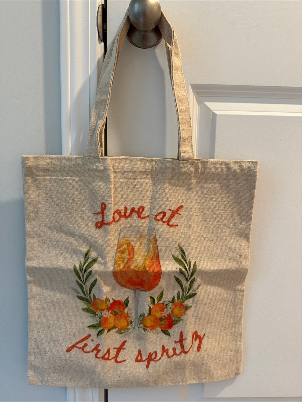 Canvas Tote Bag with "Love at First Spritz" Floral Wine Graphic - Beige